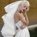 Свадебное платье с бантами на плечах фото