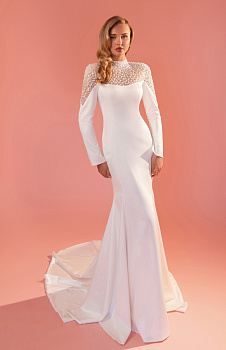 Красивое свадебное платье с роскошной вышивкой из жемчуга фото