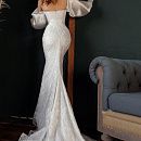 Облегающее свадебное платье с пышными рукавами фото