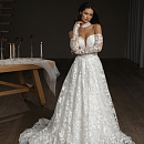 Эффектное свадебное платье из блестящего кружева, украшенного прозрачной пайеткой фото