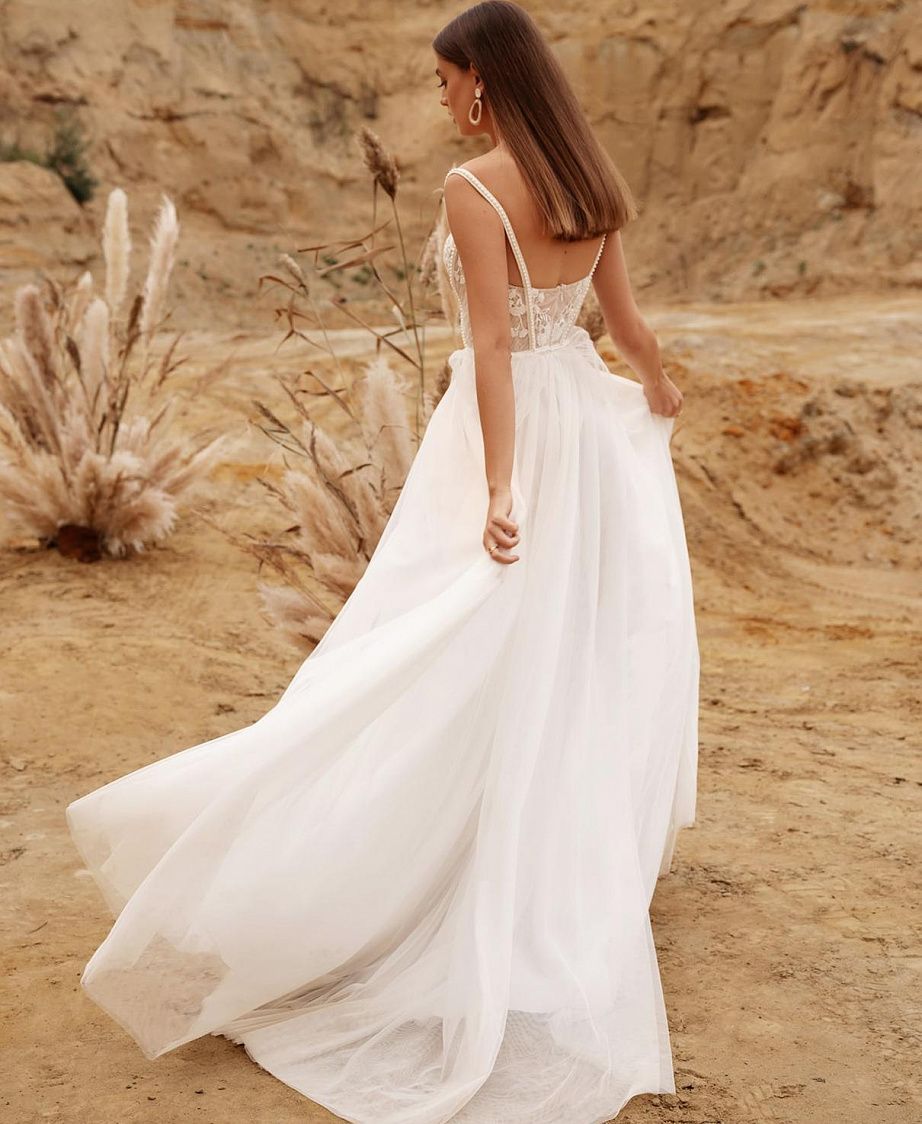 Свадебное платье с разрезом на ноге фото