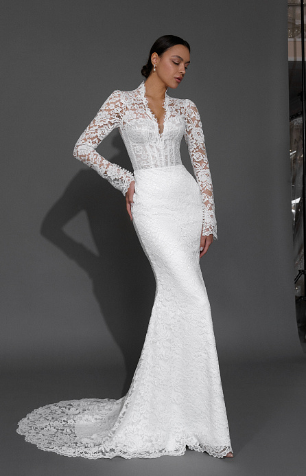 Белое кружевное свадебное платье с рукавами фото