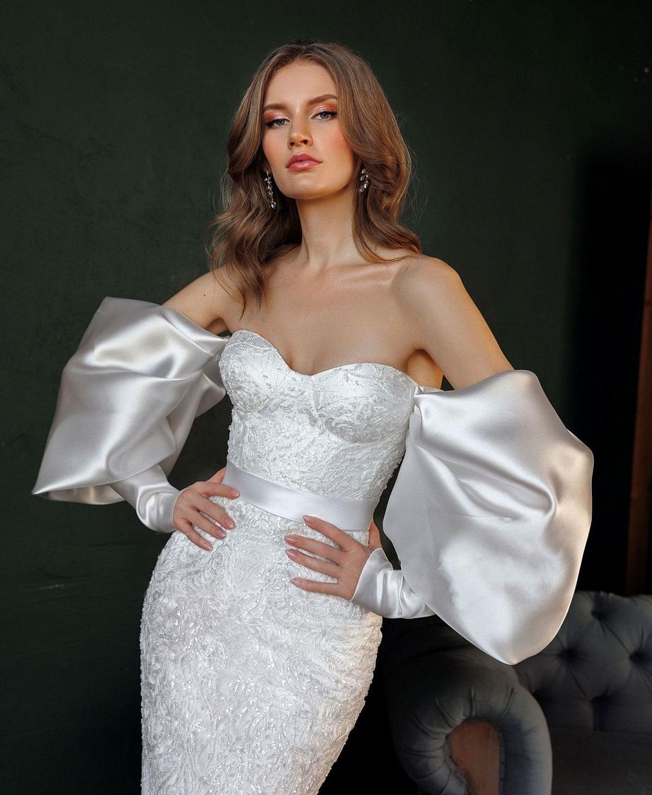 Облегающее свадебное платье с пышными рукавами фото