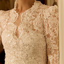 Пышное кружевное свадебное платье со съемным болеро фото