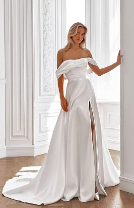 Лаконичное свадебное платье с ассиметричными бретелями фото