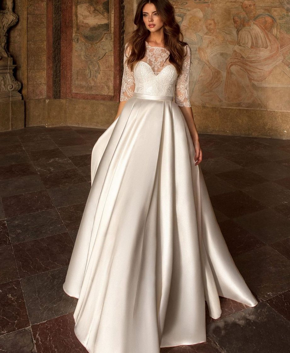 Классическое свадебное платье с атласной юбкой фото