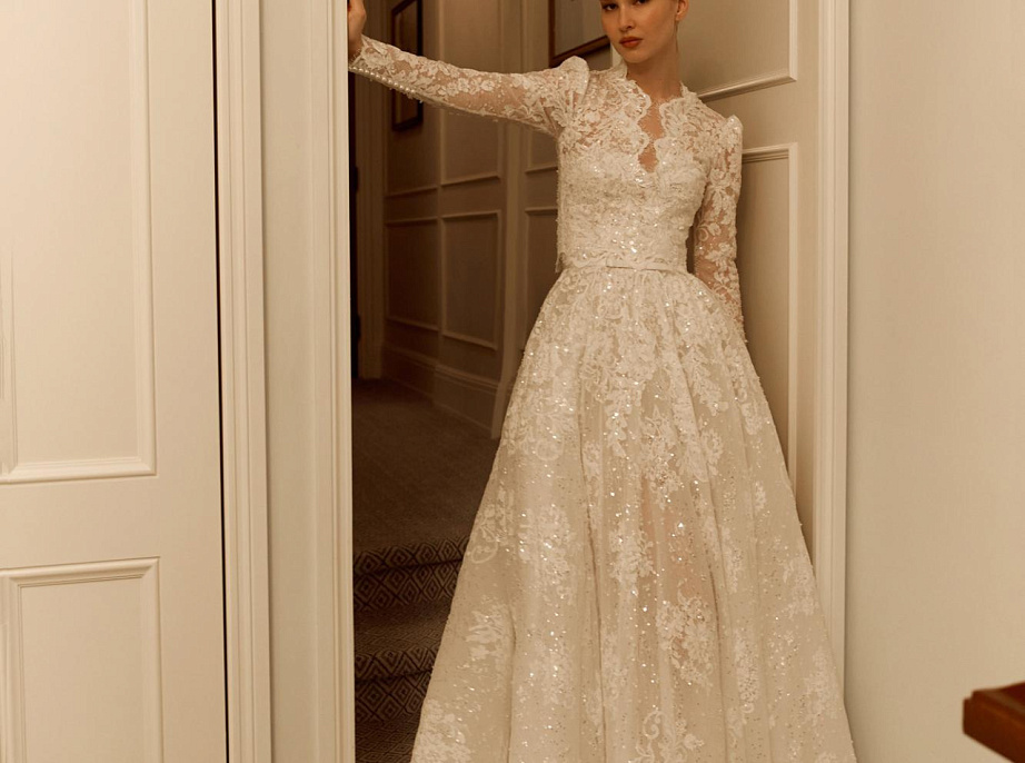 Пышное кружевное свадебное платье со съемным болеро фото