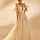 Блестящее свадебное платье с бантиками на рукавах фото