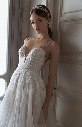 Нежное свадебное платье расшитое жемчугом и стеклярусом фото