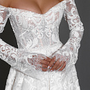 Роскошное кружевное свадебное платье с рукавами фото